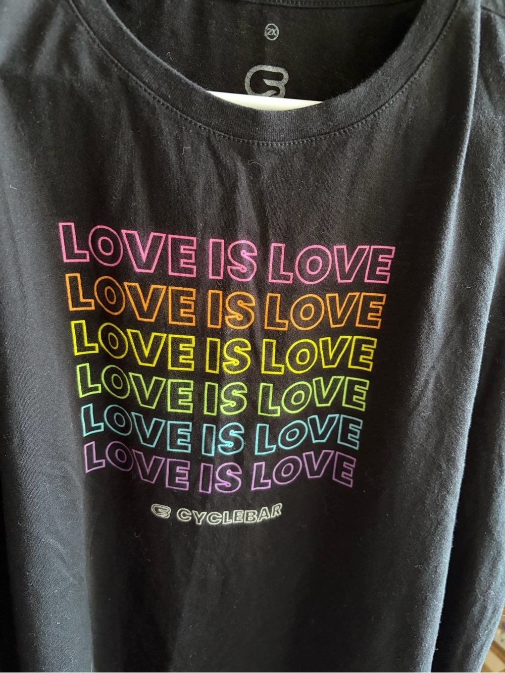 Cyclebar Black Tee with Rainbow "LOVE IS LOVE" Graphic